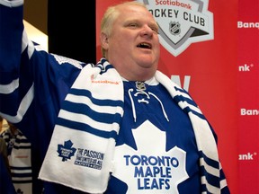 Toronto Mayor Rob Ford shows off his Maple Leafs jersey at a promotional event in May 2013. (Darren Calabrese / National Post)