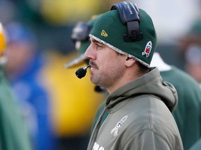 Green Bay QB Aaron Rodgers looks on from the bench during a game against the Eagles at Lambeau Field on November 10, 2013 in Green Bay. (Gregory Shamus/Getty Images)