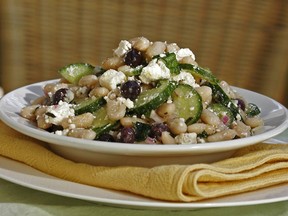 White kidney beans  with feta, olives and mint creates a protein-rich salad that's both tasty and healthy. (John McKay / Victoria Times Colonist)