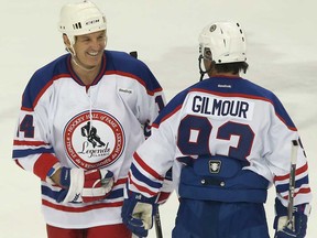 Brendan Shanahan, left, chats with Doug Gilmour during the Hockey Hall of Fame Legends Classic game at the Mattamy Athletic Center on November 10, 2013 in Toronto. (Bruce Bennett/Getty Images)