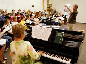 The Soli Deo Gloria Singers, shown rehearsing a few years back, present a fall concert on Saturday and Sunday in the Leamington area. (JASON KRYK / Windsor Star files)
