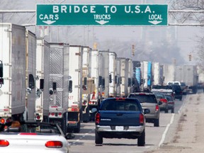 In this file photo, three-hour delays snarl truck traffic along Huron Church Road in Windsor, Ont., April 2, 2003. at the Windsor/Detroit border. (Jason Kryk/The Windsor Star)