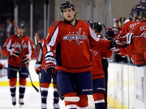 Washington's Tom Wilson celebrates with teammates after scoring a goal in the pre-season against the Boston Bruins, Tuesday, Sept. 17, 2013, in Baltimore. (THE CANADIAN PRESS/AP-Patrick Semansky)