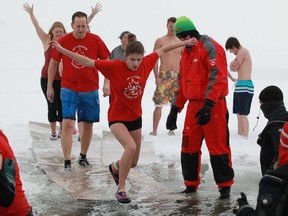 Thirty people jumped into Lake St. Clair for the 22nd annual Polar Bear Dip for the Downtown Mission, Sunday, Dec. 15, 2013.  (DAX MELMER/The Windsor Star)