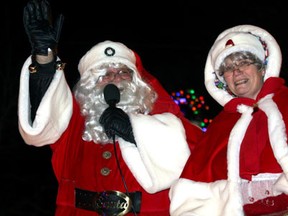 Santa and Mrs. Claus talk and wave to the large crowd at the 45th annual Windsor Santa Claus Parade presented by the Olde Sandwich Towne BIA Saturday, Dec. 7, 2013. (JOEL BOYCE/The Windsor Star)