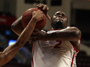 The Windsor Express DeAndre Thomas has the ball stripped while taking on the Halifax Rainmen at the WFCU Centre in Windsor on Friday, Dec. 20, 2013.                    (TYLER BROWNBRIDGE/The Windsor Star)