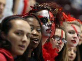 Brennan fans, from left, Caila MacGregor, Phyllis Essibrah, Mallory Parent, Kaitlin Drouillard, Payton Poisson and Bianca Mihali cheer on their team against the St. Joseph Lasers at the WFCU Centre. (TYLER BROWNBRIDGE/The Windsor Star)