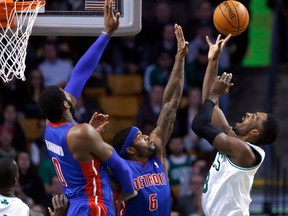 Boston's Jeff Green, right, shoots the ball against Detroit's Josh Smith, centre, and Andre Drummond Wednesday.  (AP Photo/Elise Amendola)