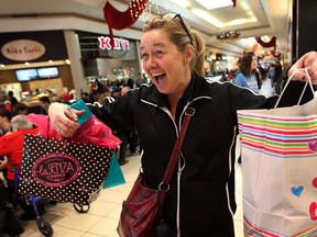 First-time Boxing Day shopper Mary Schroeder was a happy camper at Devonshire Mall, December 26, 2013.   (NICK BRANCACCIO/The Windsor Star)