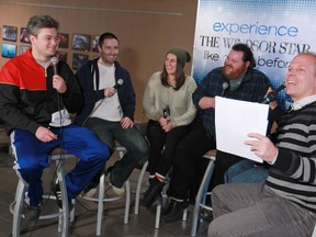 Comedians, from left, Mark Debonis, Barry Taylor, Stephanie Tolev, K Trevor Wilson, Dave Merheje, and Jon Peladeau are interviewed by Windsor Star reporter Craig Pearson in the Windsor Star News Cafe, Friday, Dec. 27, 2013.