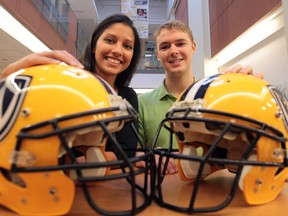 University of Windsor graduate students Suzanne Ali, left, and Michael Hatten researched concussions and contact sports at the U of W.  (JASON KRYK/The Windsor Star)
