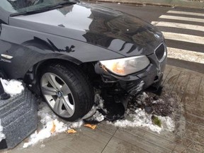 Sen. Romeo Dallaire fell asleep at the wheel Tuesday, Dec. 3, 2013, and crashed his BMW at Parliament Hill in Ottawa. (@glen_mcgregor , Twitter)