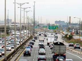 File photo of commuters making their way along the busy QEW heading to Toronto and Hamilton on Thursday, Nov. 8, 2007 near Oakville, Ont.  (Photo by (Staff) Nathan Denette/National Post)