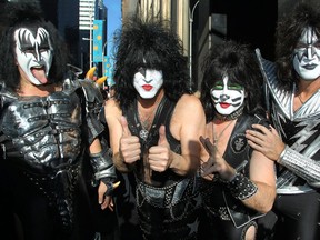 This Oct. 11, 2012 file image released by Starpix shows, from left, Gene Simmons, Paul Stanley, Eric Singer, Tommy Thayer of KISS as the band arrives at SiriusXM offices to promote their latest release "Monster," in New York. Kiss will be inducted into the 2014 Rock and Roll Hall of Fame on April 10 at the Barclays Center in New York. (AP Photo/Starpix, Amanda Schwab, File)