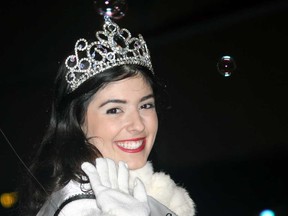 Tatiana Maranhao, Miss Teen Essex County World 2013, waves to the crowd at the Leamington Santa Claus Parade Saturday, Nov. 30, 2013. (JOEL BOYCE/The Windsor Star)