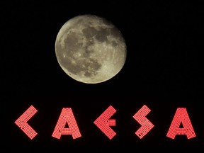 On a crystal clear night where you can make out every light panel on the Caesars Windsor sign and every crater on the moon in downtown Windsor, Ontario, Tuesday November 19, 2013. An actual crater on the moon is named Caesar Crater. (NICK BRANCACCIO/The Windsor Star)