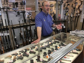 Raphael Tincher, co-owner of Ted's Pawn in Norwood, OH. talks about the responsible sale of handguns at his store. (DAN JANISSE/The Windsor Star)