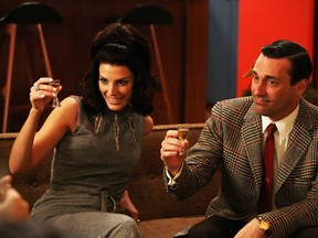 This publicity photo provided by AMC shows Jessica Pare as Megan Draper and Jon Hamm as Don Draper in a scene of "Mad Men," Season 6, Episode 2. (AP Photo/AMC, Michael Yarish)