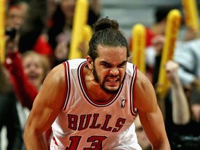 Chicago's Joakim Noah celebrates after a dunk against the New Orleans Pelicans at the United Center. (Photo by Jonathan Daniel/Getty Images)