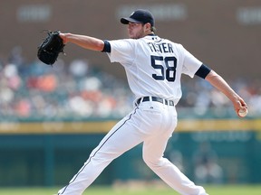 Detroit's Doug Fister throws a pitch against the  Seattle Mariners at Comerica Park. (Photo by Gregory Shamus/Getty Images)