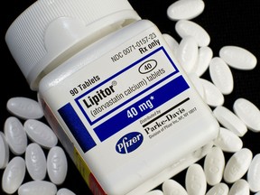 A prescription bottle of Lipitor (atorvastain calcium) tablets made by Pfizer and distributed by Parke-Davis. (Getty Images files)