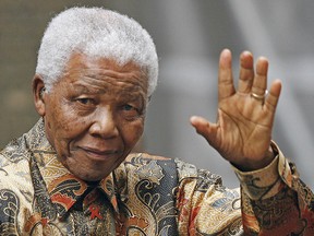 Nelson Mandela, 95, died Thursday after an extended illness. In announcing his death South African President Jacob Zuma said "we have lost our greatest son." (LEON NEAL/AFP Photo)