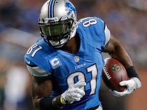 Detroit's Calvin Johnson scores a touchdown against the Green Bay Packers at Ford Field. (Photo by Gregory Shamus/Getty Images)