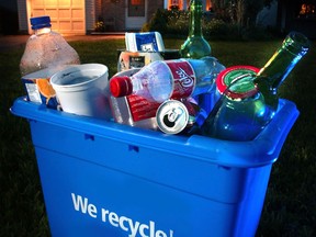 A blue box filled with recyclable materials. (Postmedia News files)