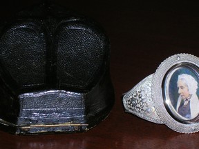 Silver bracelet and case: $1,000