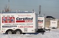 Work trailers owned by Certified Solar at 2750 Deziel Dr. in Windsor, ON. are shown Mon. Dec. 16, 2013. The company has allegedly defrauded numerous customers for more than $1 million dollars. (DAN JANISSE/The Windsor Star)
