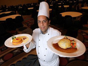 Retro-looking holiday party foods, prepared by chefs at Caesars Windsor, designed with a Mad Men-inspired menu for a New Year's party include this pineapple upside down cake, left, and beef wellington displayed by executive sous chef Rajan Mehra. (DAN JANISSE / The Windsor Star)