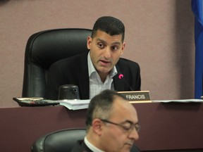 Mayor Eddie Francis, seated behind City of Windsor treasurer Onorio Colucci. and city council unveils the 2014 Budget at council chambers on December 1, 2013 in Windsor, Ontario. (JASON KRYK/The Windsor Star