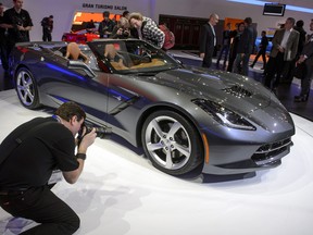 This photo from March 2013 shows the world premiere of the new Chevrolet Corvette Stingray Cabriolet at the car maker's booth at the Geneva Motor Show in Geneva. The 2015 Corvette Zo6 will be unveiled in January at the Detroit auto show. (FABRICE COFFRINI / AFP / Getty Images)
