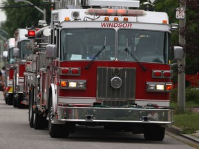 In this file photo, a row of Windsor firetrucks are parked on a Windsor street as the fire department responded to a call on August 31, 2013.  (DAX MELMER/The Windsor Star)
