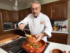 Chef Vincenzo Del Duca displays his fish stew which is a southern Italian dish that is often served at Christmas. (DAN JANISSE / The Windsor Star)