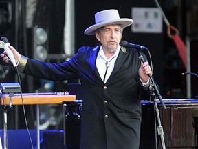 Bob Dylan performs  at  a festival in western France on July 22, 2012. French authorities have filed preliminary charges against Dylan over an interview in Rolling Stone magazine which they claim were a “public insult and inciting hate.”  (Associated Press files)