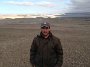 Jeff Thrasher, a graduate of Holy Names high school in Windsor, is pictured in the High Arctic where he filmed NASA researcher Pascal Lee studying one the largest impact craters on earth. Thrasher’s documentary is called Mission Asteroid, airing on CBC-TV’s DocZone on Dec. 5, 2013.