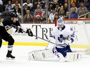 Toronto's Jonathan Bernier, left, makes a save against Pittsburgh's Chris Conner at Consol Energy Center on December 16, 2013 in Pittsburgh, Pennsylvania.  (Justin K. Aller/Getty Images)