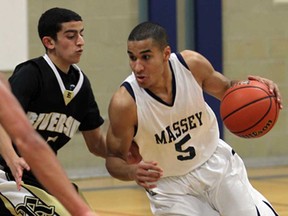 Massey's Brandon Reaume, right, dribbles around Riverside's Simon Yacoub during boys high school basketball Friday Dec. 6, 2013. (NICK BRANCACCIO/The Windsor Star)