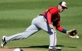 Washington's Steve Lombardozzi chases down a single by Philadelphia during an exhibition game in Clearwater, Fla. The Detroit Tigers have traded starting pitcher Doug Fister to the Nationals for three players, one of which is Lombardozzi. (AP Photo/Matt Slocum, File)