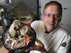 Professional pastry chef Pascal Tenthorey recently launched a pastry catering business after years working at Caesars Windsor. He specializes in yule logs and more complex pastries. He's shown recently at his Tecumseh business with one of his yule logs.   (DAN JANISSE / The Windsor Star)