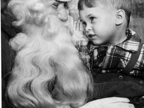 Dec. 17, 1949: "From all I've heard, you've been a very good boy all year," Santa tells Bobby. Of course, Bobby's requests are a top secret and off the record. Bobby saw Santa yesterday during a trip to C.H. Smith toyland with other boys and girls in the cerebral palsy group. The staff of the Red Cross curative workshop conducted the tour. Santa's flowing beard thrilled Bobby and it's a sure thing he'll be dreaming of Santa and his reindeer until he wakes up early Christmas Day. (Jack Dalgleish/The Windsor Star)