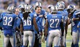 Detroit Lions head coach Jim Schwartz gives instructions during overtime against New York at Ford Field on December 22, 2013 in Detroit. The Giants beat the Lions 23-20. (Leon Halip/Getty Images)