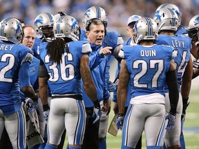 Detroit Lions head coach Jim Schwartz gives instructions during overtime against New York at Ford Field on December 22, 2013 in Detroit. The Giants beat the Lions 23-20. (Leon Halip/Getty Images)