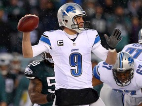 Detroit QB Matthew Stafford looks to pass against the Eagles on December 8, 2013 in Philadelphia. The Lions host the Baltimore Ravens Monday night. Elsa/Getty Images)