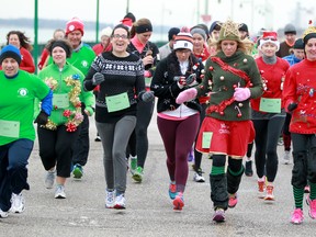 WINDSOR, ONT .:JULY 20, 2013 -- Dozens of runners participated in the Ugly Sweater 5 km Run along the Windsor waterfront, Sunday, Dec. 29, 2013.  Money was being raised for the neonatal intensive care unit at Windsor Regional Hospital.  (DAX MELMER/The Windsor Star)