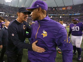 Vikings head coach Leslie Frazier, right, and Bears head coach Marc Trestman greet each other after the game on December 1, 2013 in Minneapolis. (Adam Bettcher/Getty Images)