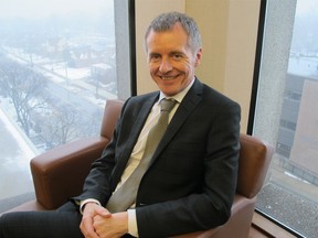 University of Windsor president Alan Wildeman in his office in the Chrysler Hall Tower on Dec. 20, 2013. (Dalson Chen / The Windsor Star)