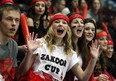 Brennen students Alex Keys, left, Justice Williamson-Deneau, Taylor Hryniw, Andrea Bisutti, Ayla Hadland and Mandy Johnstone cheer during Zakoor Cup at the WFCU Centre, Thursday December 19, 2013.  Brennan defeated St. Joseph 4-2. (NICK BRANCACCIO/The Windsor Star)