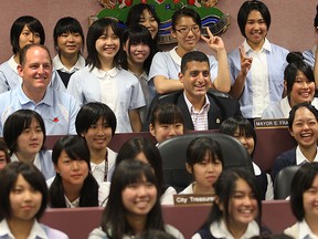 Students from Fujisawa, Japan get their photo taken with Windsor mayor Eddie Francis and city councillor Drew Dilkins in council chambers at the city hall square Aug. 3, 2010, during a visit to Windsor. More than 60 students from Windsor's sister city met with mayor Eddie Francis and Dilkins and toured city hall. (DAN JANISSE/The Windsor Star)